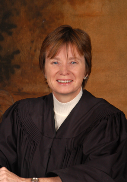 Judge Schumacher